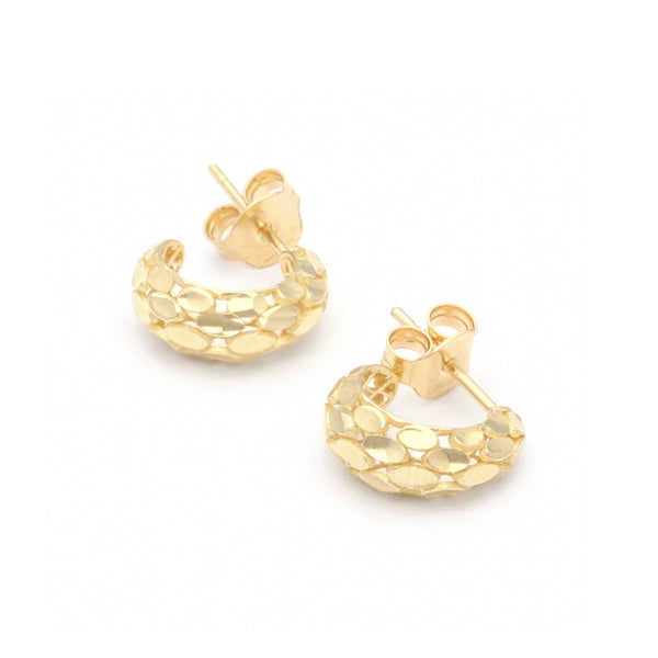 Aretes calados en oro amarillo 14 kilates.