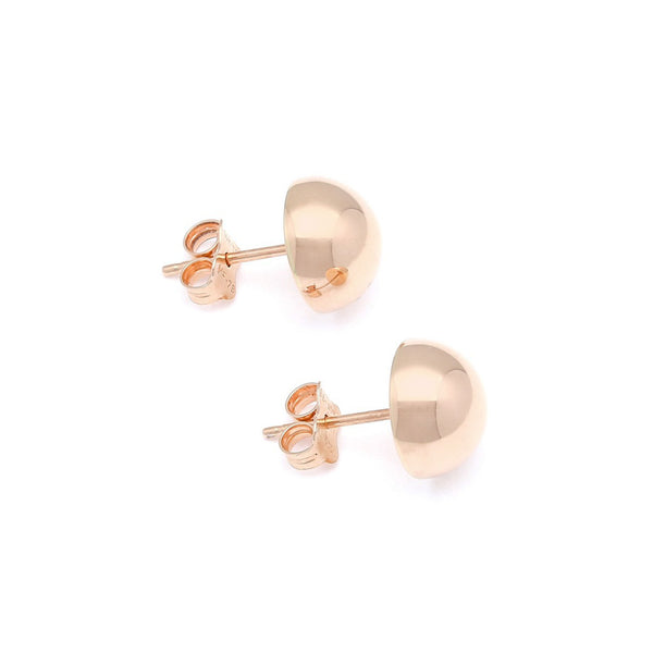 Aretes huecos motivo media esfera en oro rosa 14 kilates.