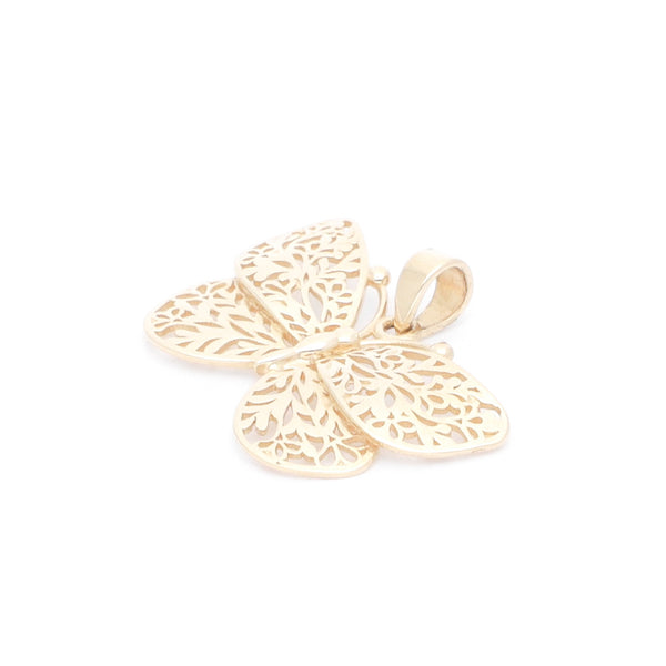 Dije calado motivo mariposa en oro amarillo 14 kilates.