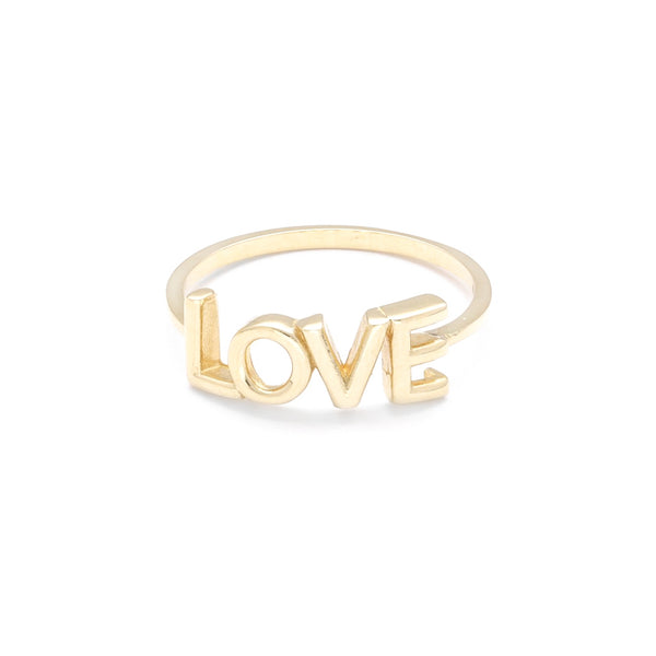 Anillo liso motivo letras LOVE en oro amarillo 14 kilates.