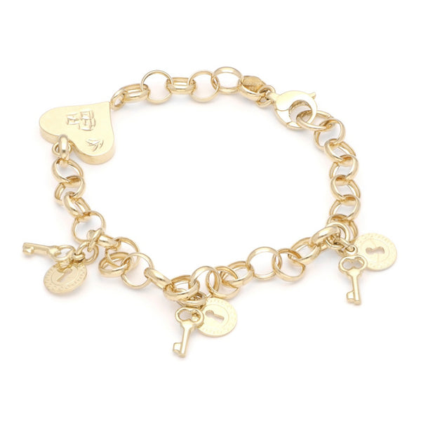 Pulsera eslabón cruzado con aplicación y colgantes motivo candado y llave en oro amarillo 14 kilates.