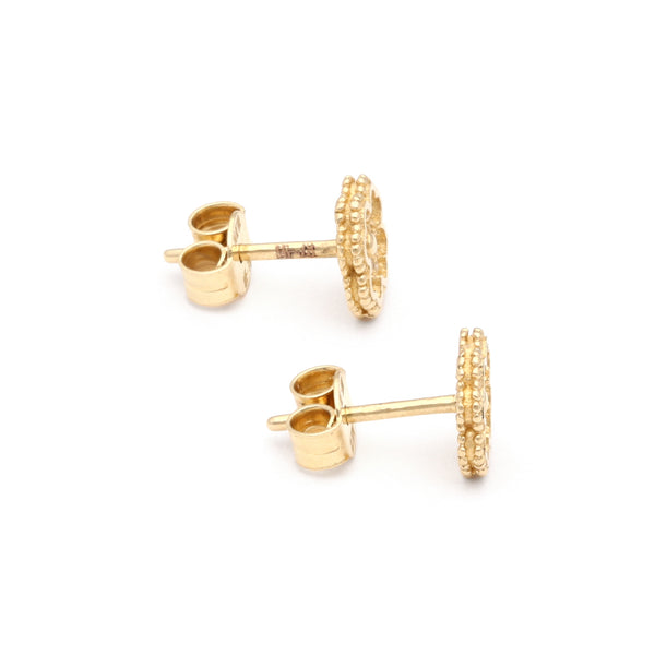 Aretes diseño especial con circonias motivo flor en oro amarillo 14 kilates.