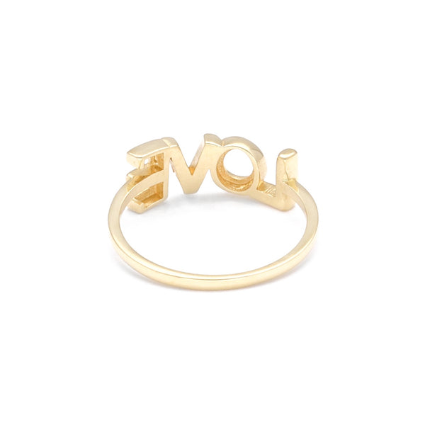 Anillo liso motivo letras LOVE en oro amarillo 14 kilates.
