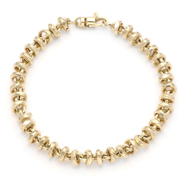 Pulsera eslabón articulado en oro amarillo 14 kilates.
