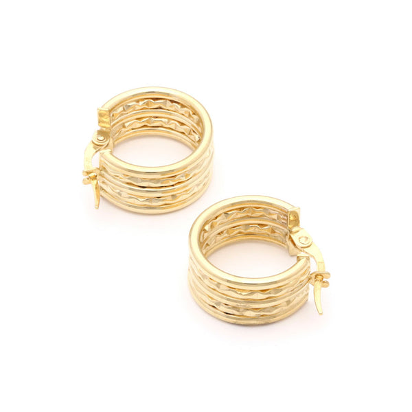 Arracadas facetadas en oro amarillo 14 kilates.