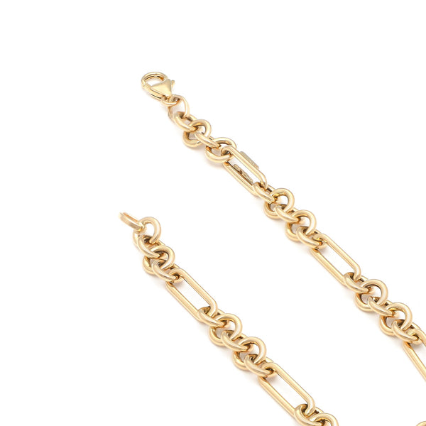 Pulsera eslabón combinado en oro amarillo 14 kilates.
