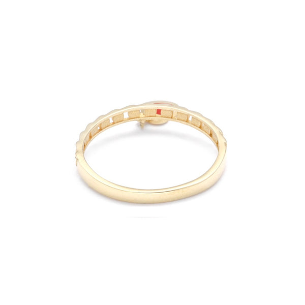 Anillo calado con colgante motivo corazón en oro amarillo 14 kilates.