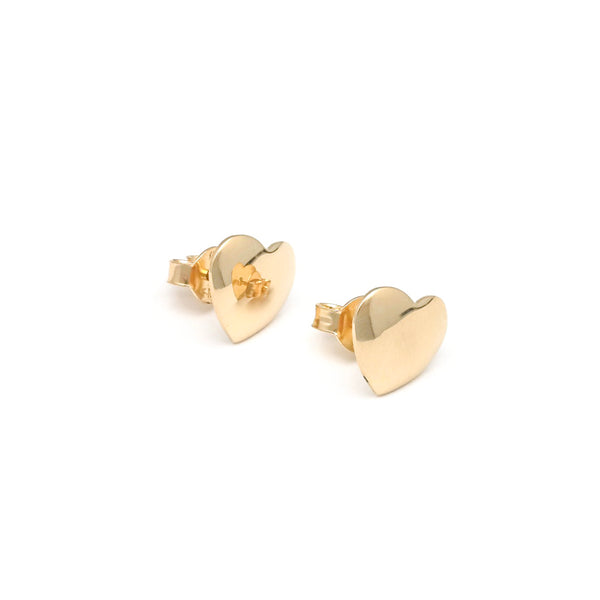 Aretes lisos motivo corazón en oro amarillo 14 kilates.
