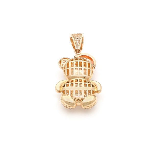 Dije hueco motivo oso con circonias y esmalte en oro amarillo 14 kilates.