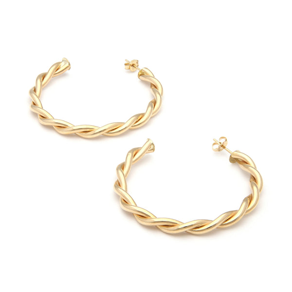Aretes torzales en oro amarillo 14 kilates.