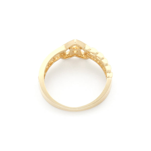 Anillo calado motivo corazón con circonias en oro amarillo 14 kilates.