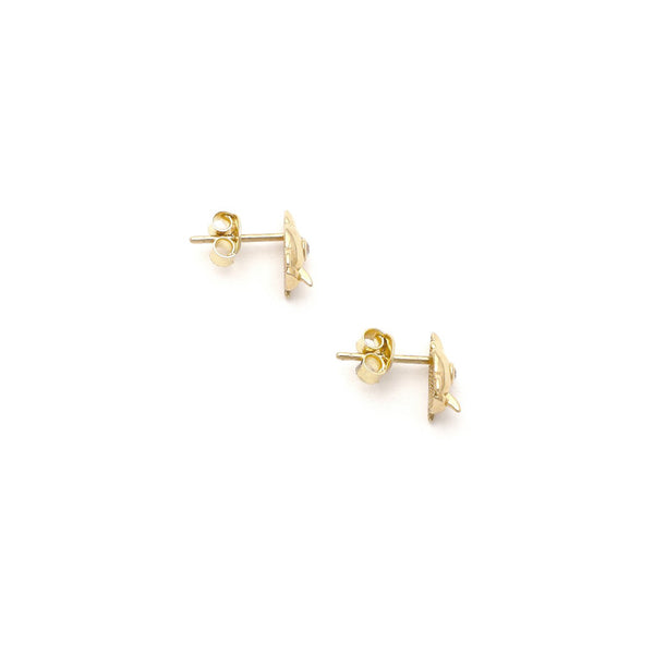 Aretes diseño especial motivo cohete con circonias en oro amarillo 14 kilates.