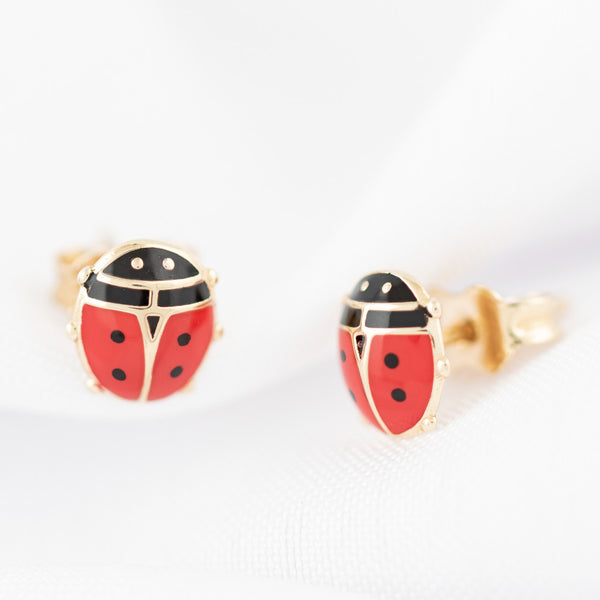 Aretes diseño especial motivo catarina con esmalte en oro amarillo 14 kilates