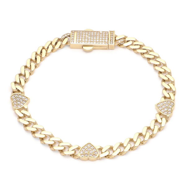 Pulsera eslabón encontrado con aplicaciones motivo corazón y circonias en oro amarillo 14 kilates.