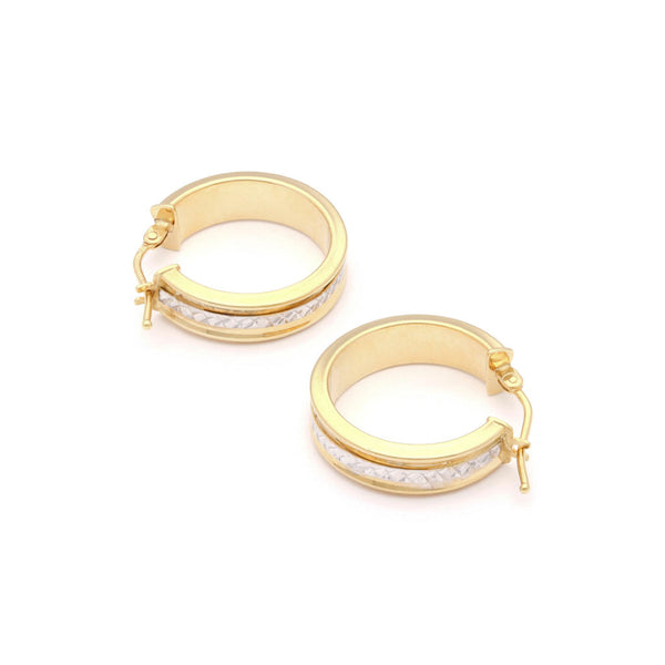Arracadas labradas en oro amarillo 14 kilates.