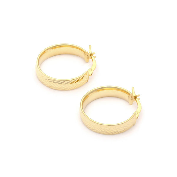 Arracadas facetadas en oro amarillo 14 kilates.