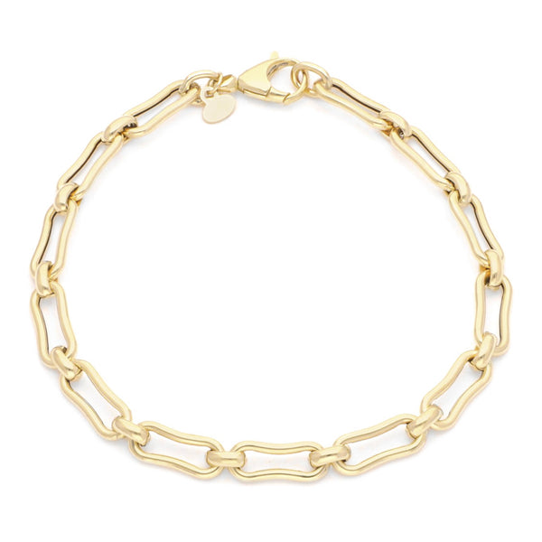 Pulsera eslabón cruzado en oro amarillo 14 kilates.