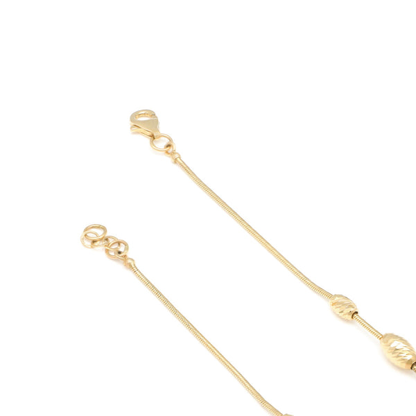 Pulsera eslabón cola de ratón con colgante motivo corazón y estrella en oro amarillo 14 kilates.