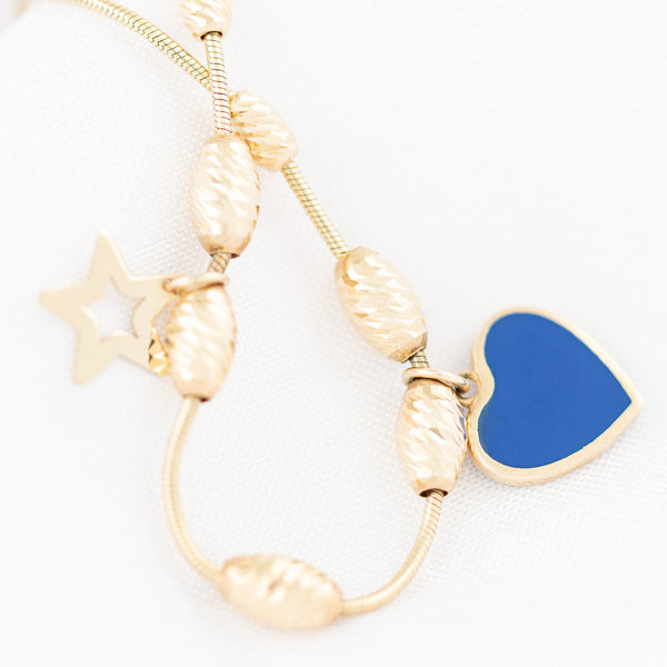Pulsera eslabón cola de ratón con colgante motivo corazón y estrella en oro amarillo 14 kilates.