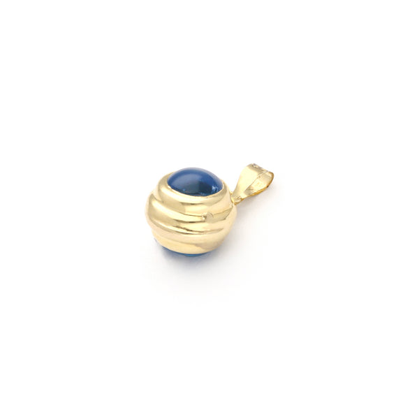 Dije diseño especial con sintético motivo ojo en oro amarillo 14 kilates.