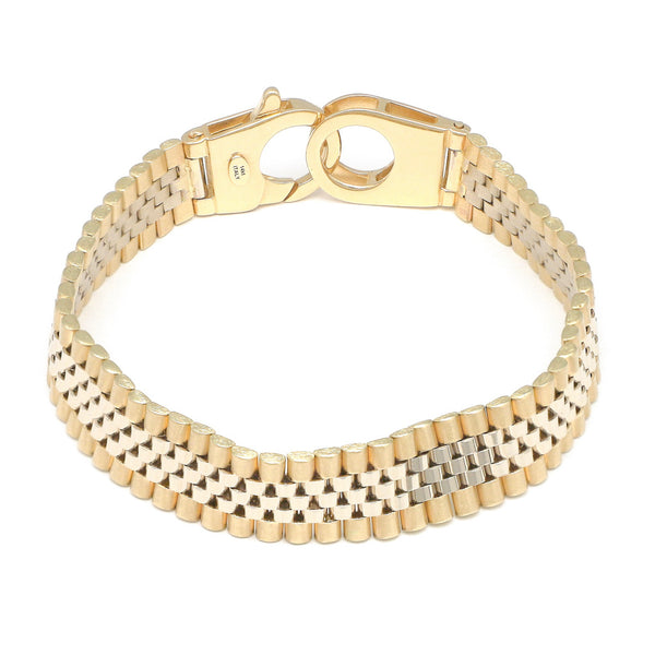Pulsera eslabón articulado con aplicación motivo corona en oro dos tonos 14 kilates.