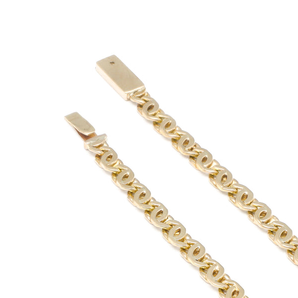 Pulsera eslabón nudo egipcio en oro amarillo 14 kilates.