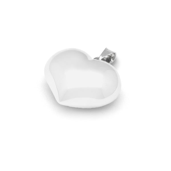 Dije hueco motivo corazón en oro blanco 14 kilates.