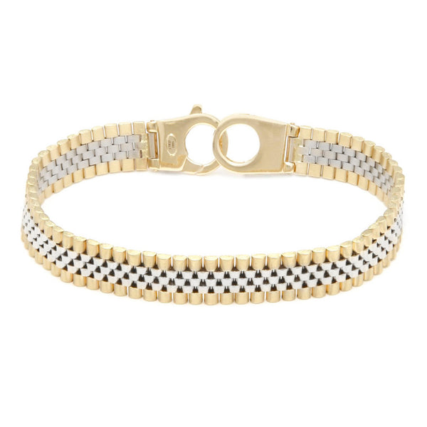 Pulsera eslabón articulado en oro dos tonos 14 kilates.