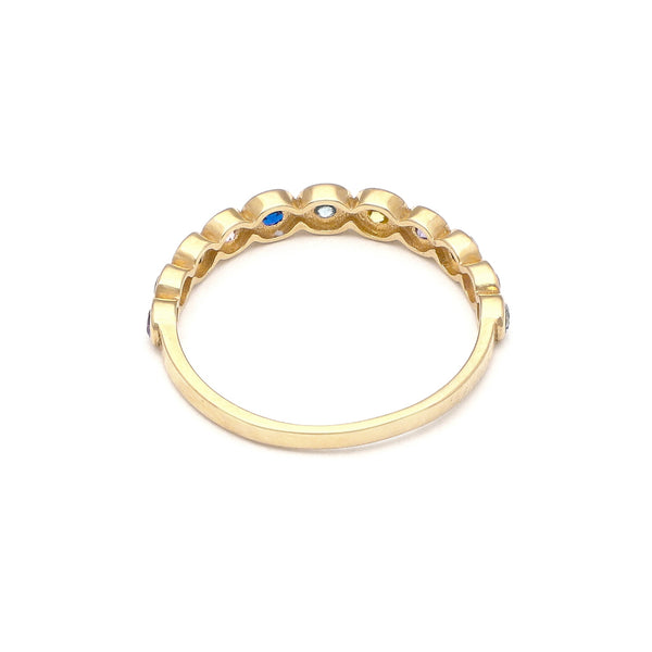 Anillo diseño especial con sinteticos en oro amarillo 14 kilates.