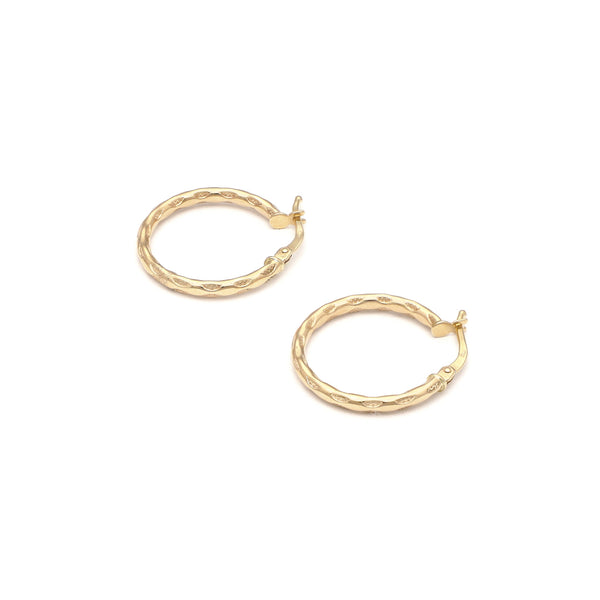 Arracadas huecas en oro amarillo 14 kilates.