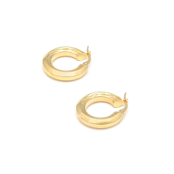 Arracadas facetadas en oro amarillo 14 kilates.