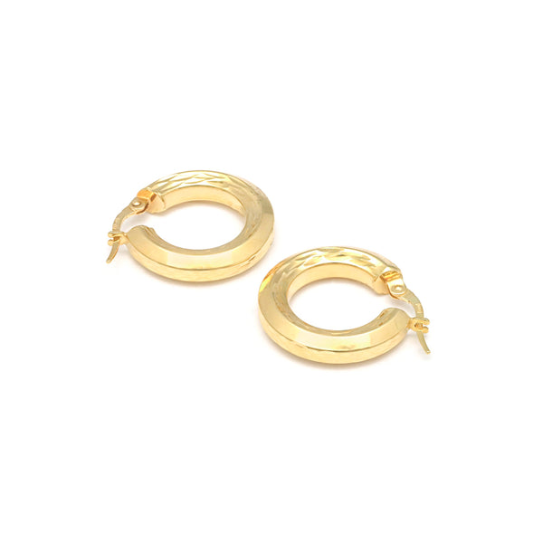 Arracadas facetadas en oro amarillo 14 kilates.