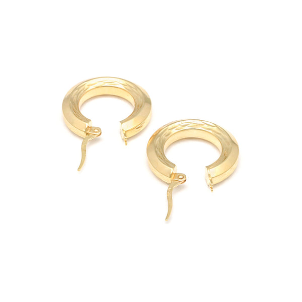 Arracadas facetadas en oro amarillo 14 kilates.