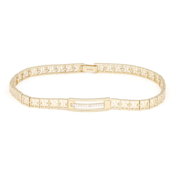 Pulsera eslabón articulado con circonias en oro amarillo 14 kilates.