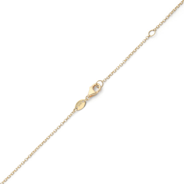 Collar eslabón cruzado con colgantes motivo corazones de madre perla en oro amarillo 14 kilates.