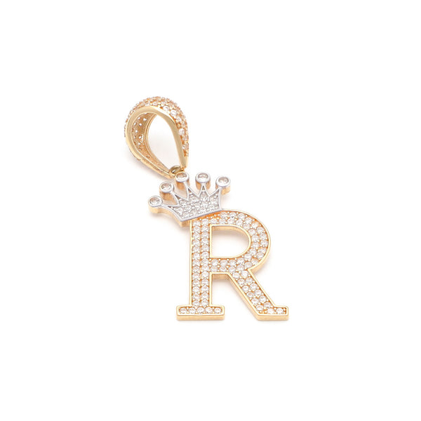 Dije diseño especial motivo letra R con corona en oro amarillo 14 kilates.