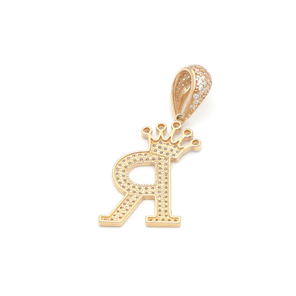 Dije diseño especial motivo letra R con corona en oro amarillo 14 kilates.