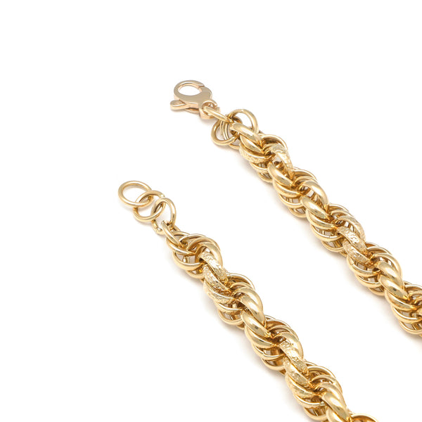 Pulsera eslabón tejido en oro amarillo 14 kilates.
