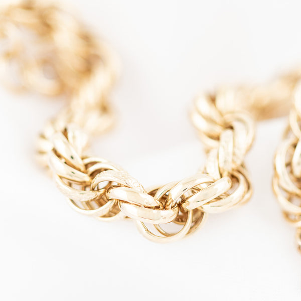 Pulsera eslabón tejido en oro amarillo 14 kilates.