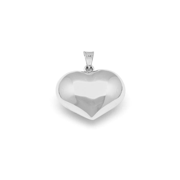 Dije hueco motivo corazón en oro blanco 14 kilates.