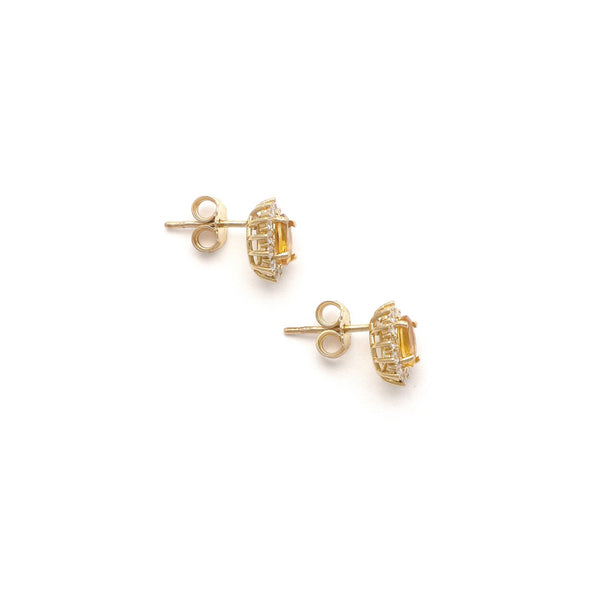 Aretes diseño especial con sintéticos en oro amarillo 14 kilates.