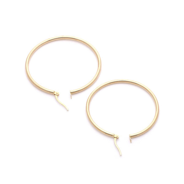 Arracadas lisas en oro amarillo 14 kilates.