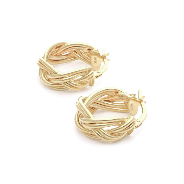 Arracadas trenzadas en oro amarillo 14 kilates.