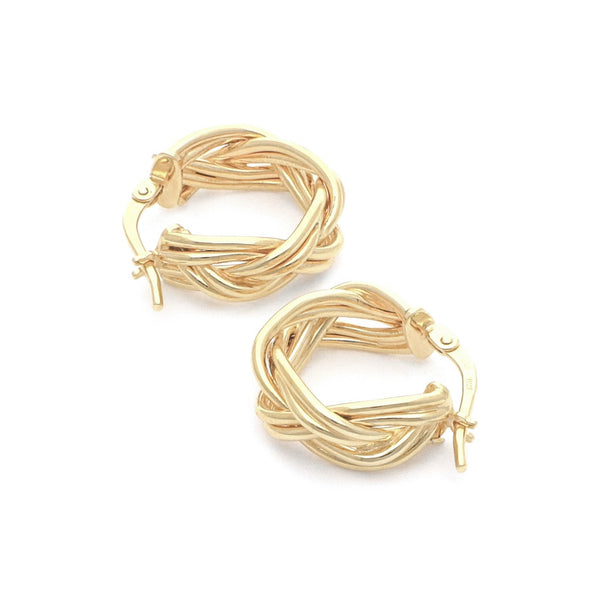 Arracadas trenzadas en oro amarillo 14 kilates.