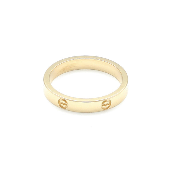 Argolla diseño especial motivo tornillos en oro amarillo 14 kilates.