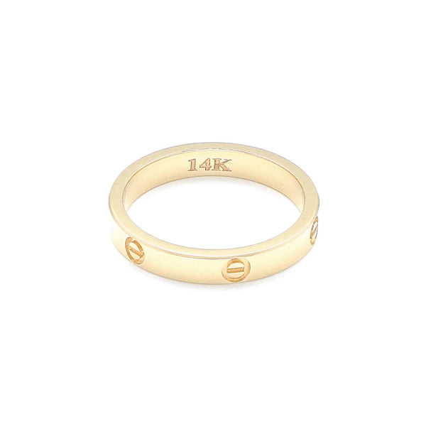 Argolla diseño especial motivo tornillos en oro amarillo 14 kilates.