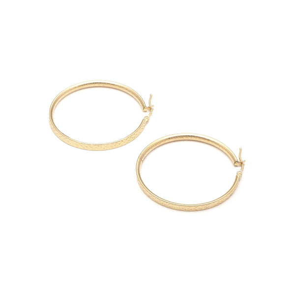 Arracadas facetadas en oro amarillo 14 kilates.