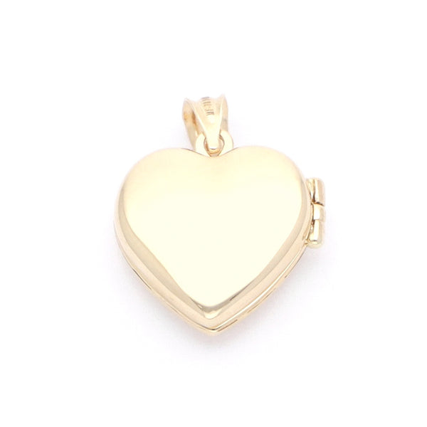 Dije guardapelo liso motivo corazón en oro amarillo 14 kilates.