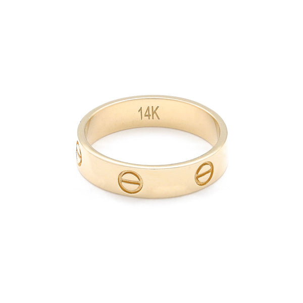 Argolla diseño especial motivo tornillos en oro amarillo 14kilates.