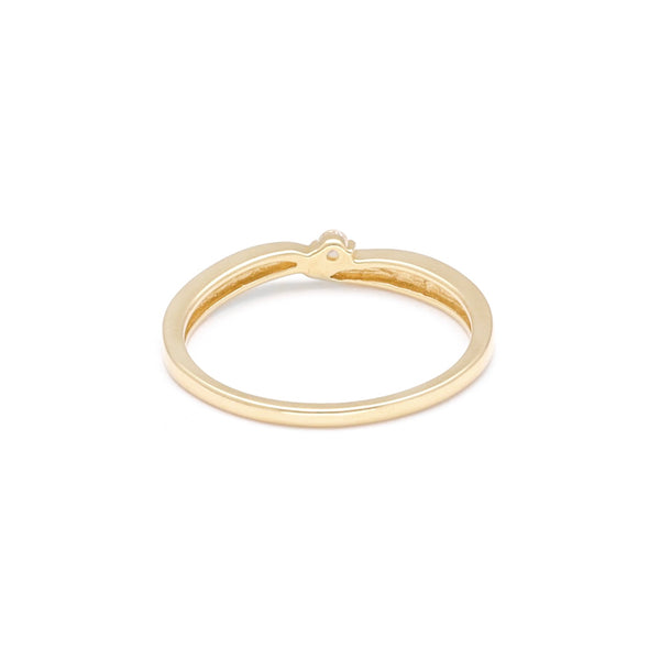 Anillo de compromiso con sintético en oro amarillo 14 kilates.